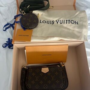 Louis Vuitton multi pochette cross body.
